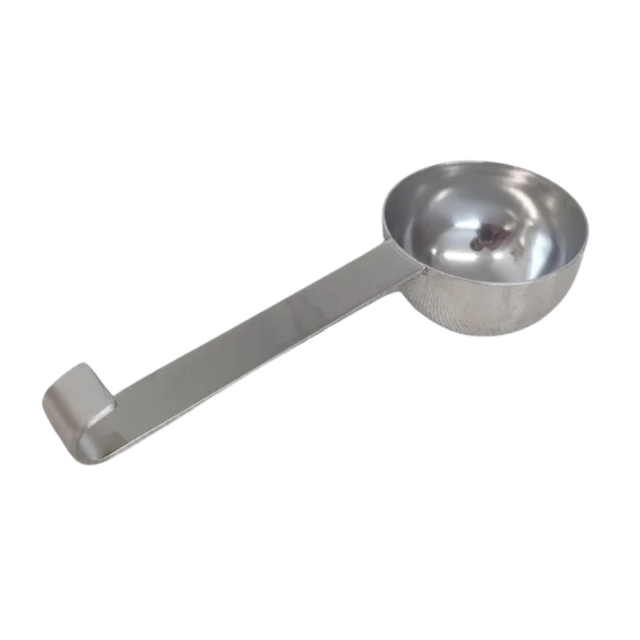 A metal scoop and two sachets, on us